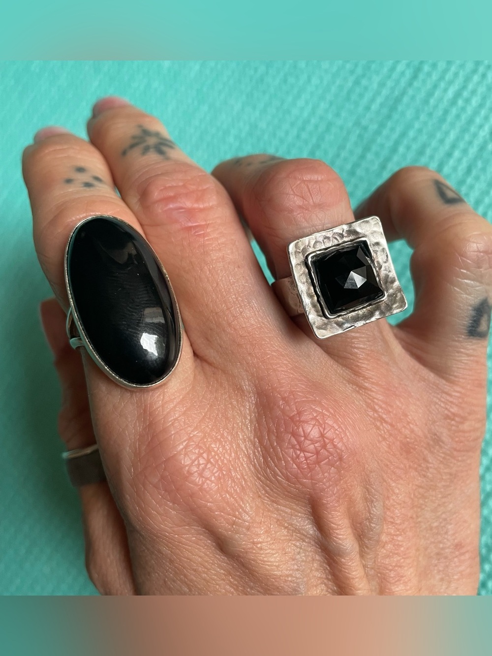 Set of two silver rings with black stones